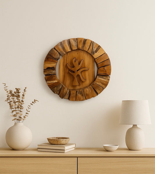 One-of-a-kind round teak wood wall sculpture featuring an organic botanical carving. Handcrafted wall decor for natural, modern, and gallery-inspired interiors.