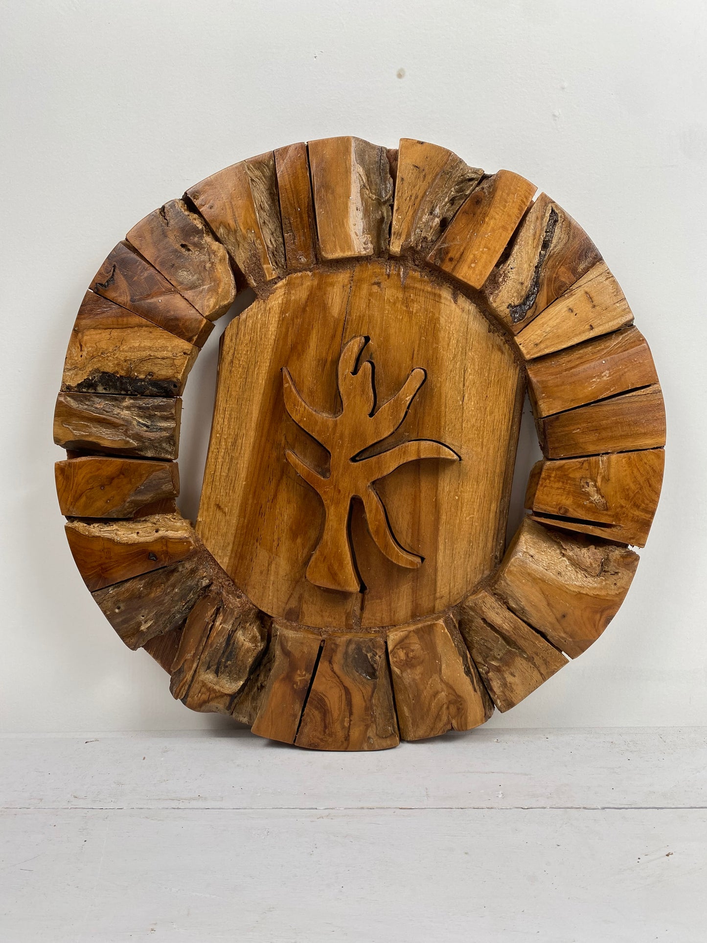 Organic Teak Round Wall Sculpture – Carved Botanical Silhouette
